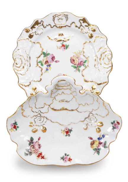 AN ENGLISH IRONSTONE GILT AND TRANSFER PRINTED AND ENRICHED PART DESSERT SERVICE,