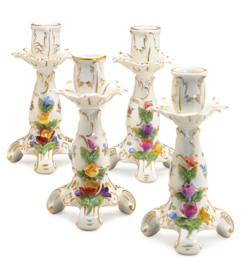 A SET OF FOUR GERMAN PORCELAIN FLOWER ENCRUSTED CANDLESTICKS,