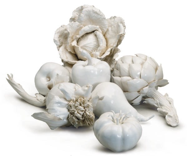 A GROUP OF WHITE GLAZED EARTHENWARE MODELS OF FRUIT AND VEGETABLES,