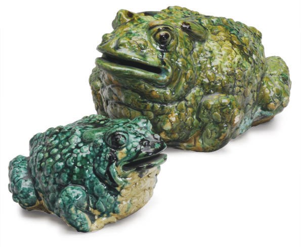 TWO TERRACOTTA MODELS OF TOADS IN GRADUATED SIZES,