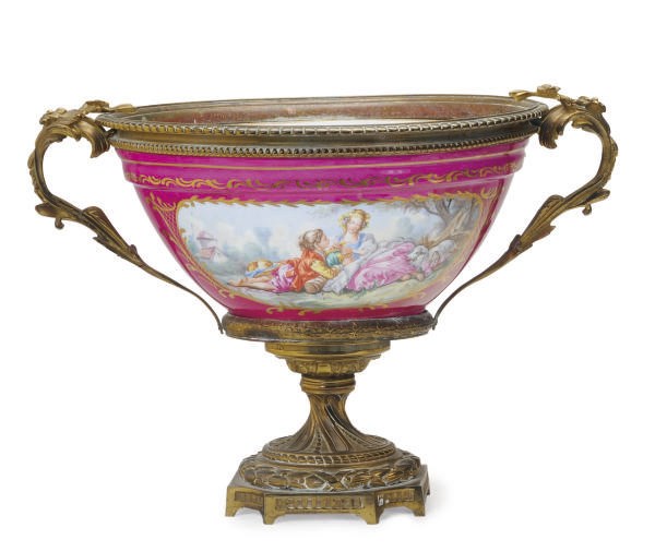 A GILT-METAL MOUNTED SÈVRES-STYLE CLARET-GROUND TWO HANDLED CENTERPIECE BOWL,