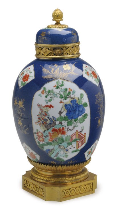 A GILT METAL-MOUNTED CHINESE EXPORT STYLE PORCELAIN POWDER BLUE GROUND FAMILLE VERT JAR AND COVER,