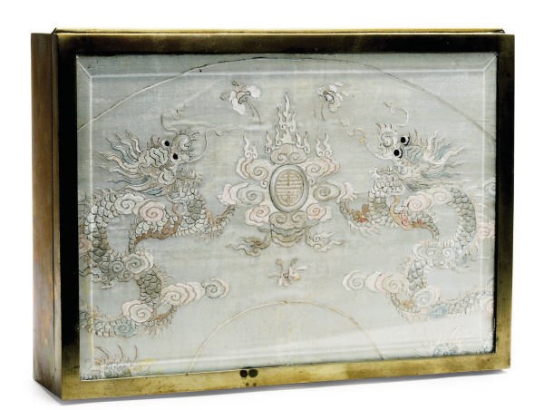 A CHINESE SILK EMBROIDERED TEXTILE FRAGMENT MOUNTED ON A BRASS BOX WITH HINGED COVER,