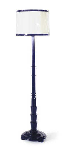 AN EBONIZED FLOOR LAMP,