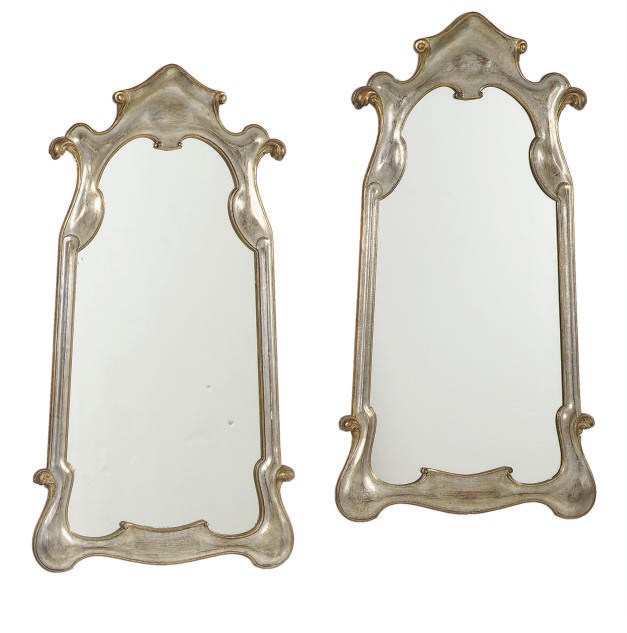 A PAIR OF SILVERED AND GILTWOOD MIRRORS,