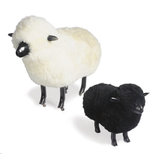TWO EBONIZED AND WOOL FIGURES OF SHEEP,