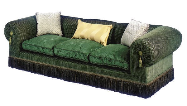 A GREEN-UPHOLSTERED SOFA,