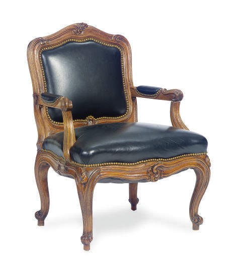 A WALNUT AND UPHOLSTERED FAUTEUIL,