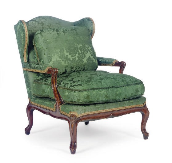 A FRUITWOOD AND GREEN DAMASK UPHOLSTERED WINGBACK FAUTEUIL,
