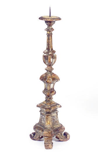 A SILVERED AND GILTWOOD PRICKET STICK,
