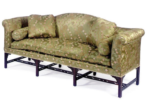 A MAHOGANY AND FLORAL-UPHOLSTERED SOFA,