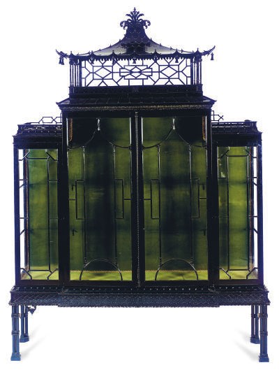 AN EBONIZED CABINET-ON-STAND,