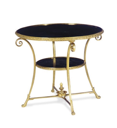 AN ORMOLU AND MARBLE GUERIDON,