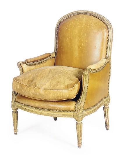 A FRENCH GREEN-PAINTED AND LEATHER-UPHOLSTERED BERGERE,