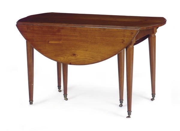 A LOUIS XVI MAHOGANY EXTENDING DROP-LEAF DINING TABLE,