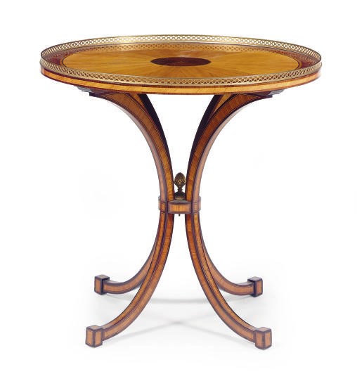 A GILT-METAL MOUNTED MAHOGANY AND TULIPWOOD GUERIDON,