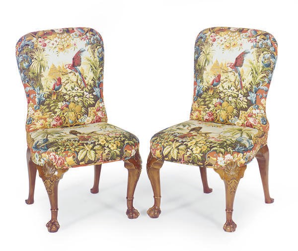 A SET OF FOUR MAHOGANY AND UPHOLSTERED SIDE CHAIRS,