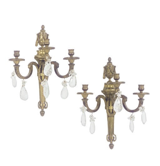 A PAIR OF GILT-BRONZE AND ROCK-CRYSTAL THREE-BRANCH WALL LIGHTS,