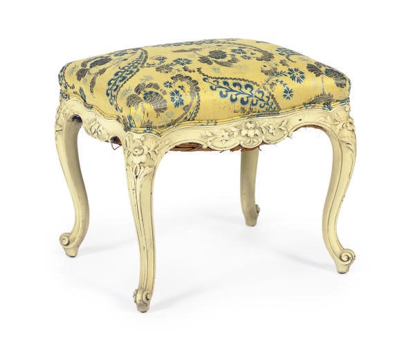 A FRENCH CREAM-PAINTED AND UPHOLSTERED SERPENTINE STOOL,