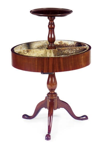 AN ENGLISH MAHOGANY DUMBWAITER-JARDINIERE,