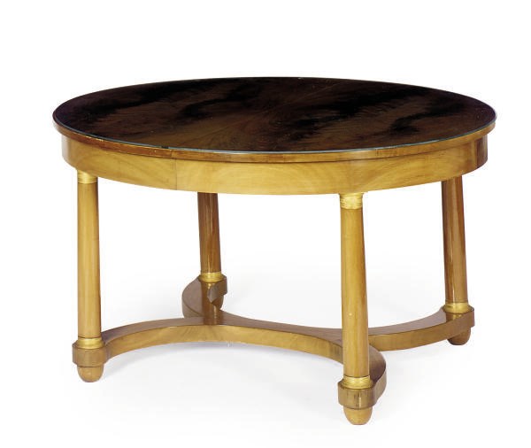 A GILT-METAL MOUNTED MAHOGANY EXTENDING DINING TABLE,