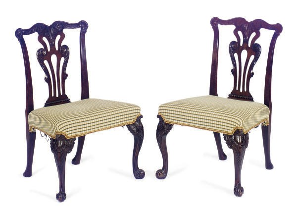 A PAIR OF MAHOGANY AND ROSEWOOD SIDE CHAIRS**,