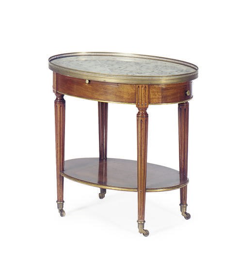 A FRENCH BRASS-MOUNTED MAHOGANY MARBLE TOP OVAL-FORM SIDE TABLE,