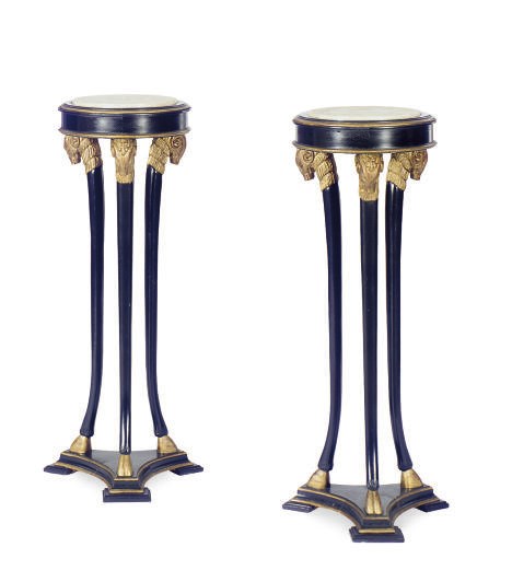 A PAIR OF EBONIZED AND PARCEL-GILT TORCHERES,