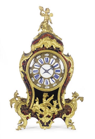 A FRENCH ORMOLU-MOUNTED TORTOISESHELL AND BRASS BRACKET CLOCK**,