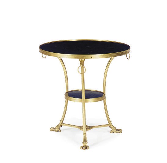 A PAIR OF ORMOLU AND BLACK FOSSIL MARBLE GUERIDONS,