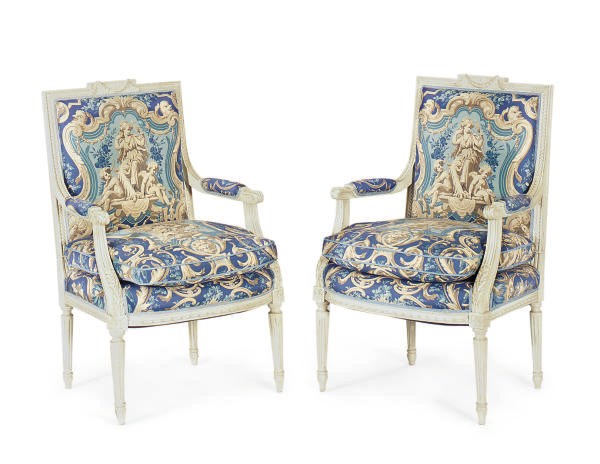 A PAIR OF FRENCH CREAM-PAINTED AND UPHOLSTERED FAUTEUILS,