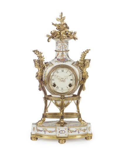 AN ORMOLU-MOUNTED PORCELAIN CLOCK,