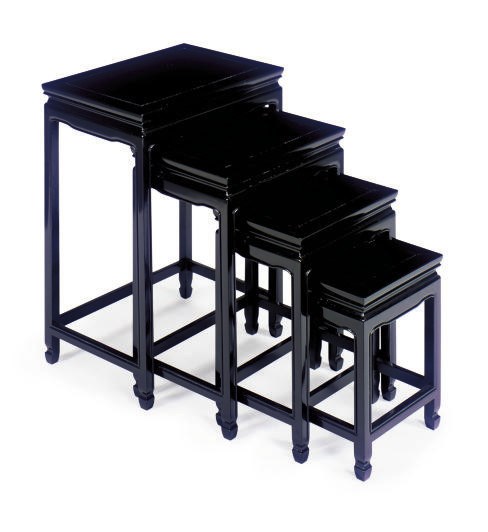 A SET OF BLACK LACQUERED NESTING TABLES,