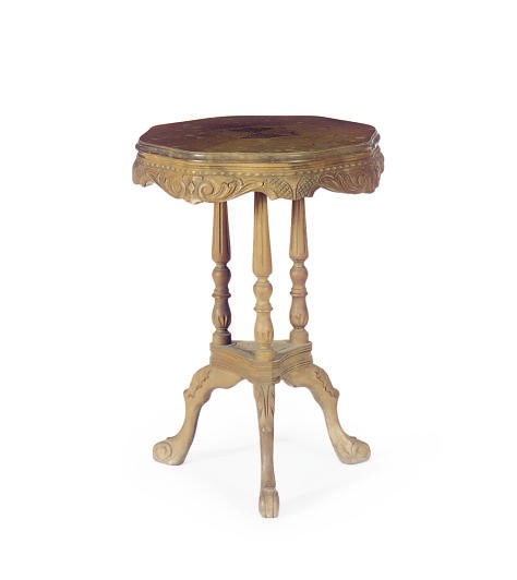 A CARVED WALNUT TRIPOD TABLE,