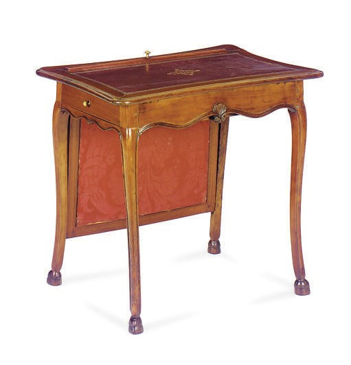 A FRENCH FRUITWOOD WRITING TABLE,