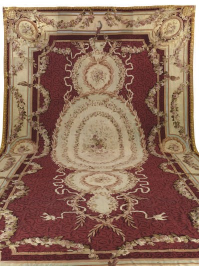 AN AUBUSSON CARPET,