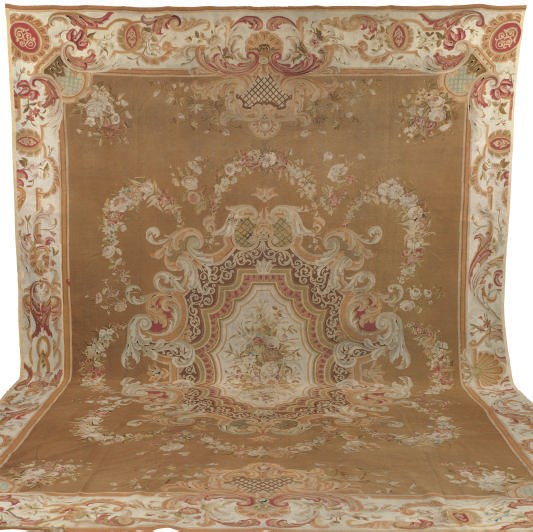 AN AUBUSSON CARPET,