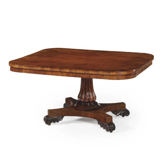A WILLIAM IV MAHOGANY AND ROSEWOOD DINING-TABLE**,