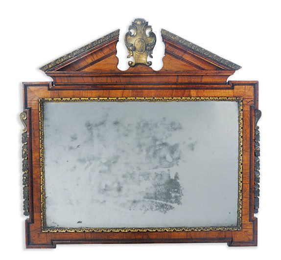 A GEORGE II STYLE WALNUT AND PARCEL-GILT OVERMANTEL MIRROR,