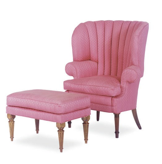 A MAHOGANY AND UPHOLSTERED WINGBACK ARMCHAIR AND STOOL,