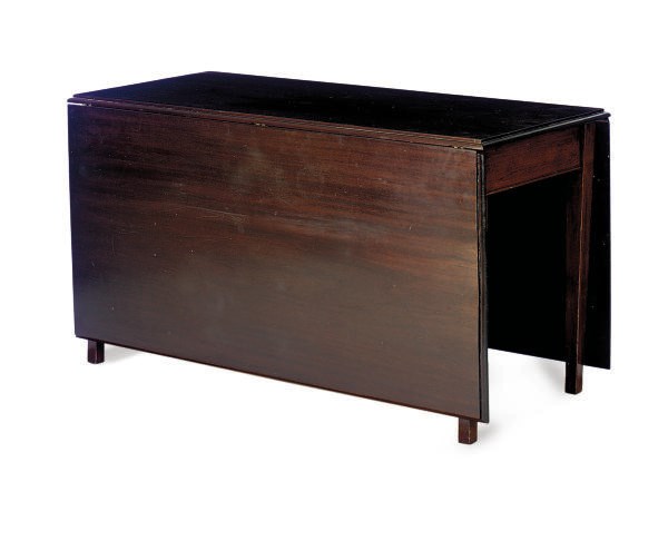 A MAHOGANY DROP-LEAF TABLE