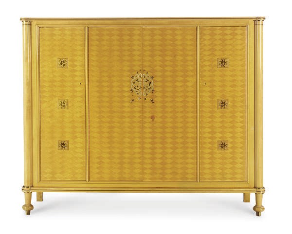 A FRENCH ART DECO PEWTER AND BRASS INLAID SYCAMORE CABINET**,