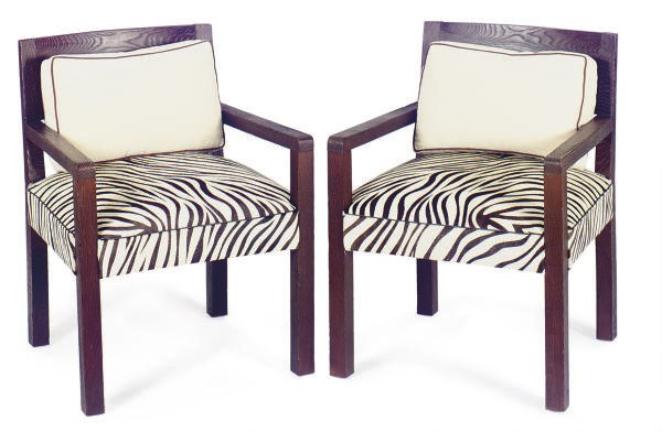 A PAIR OF STAINED OAK AND ZEBRA HIDE UPHOLSTERED ARMCHAIRS,