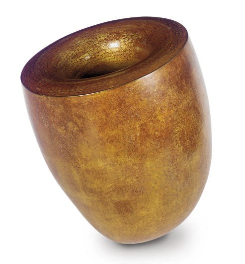A PATINATED HAMMERED METAL VASE,