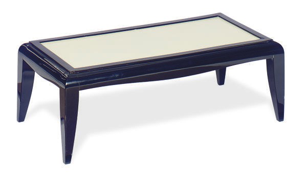 AN EBONIZED AND GLASS LOW TABLE,