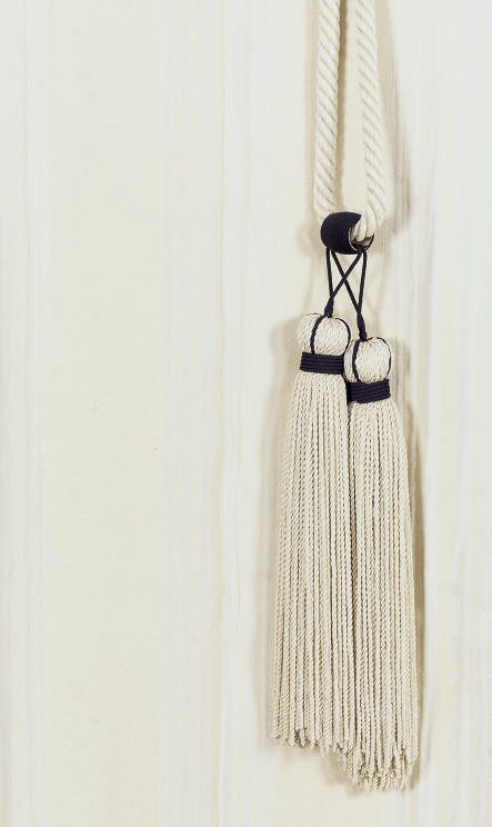 A GROUP OF CREAM-STRIPED CURTAIN PANELS,