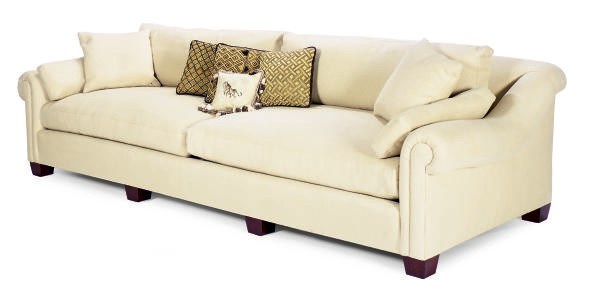 A BEIGE WOVEN UPHOLSTERD SOFA,