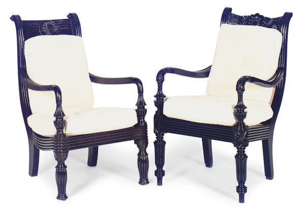 TWO SINGHALESE EBONY AND CANED OPEN ARMCHAIRS,