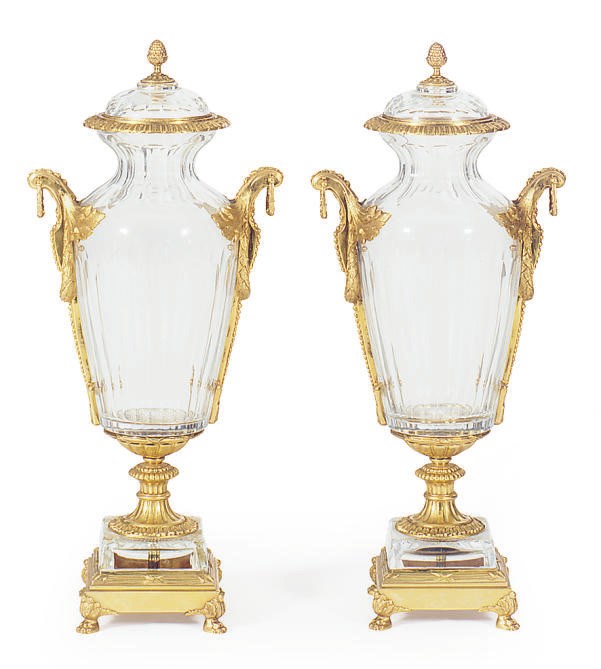 A PAIR OF ORMOLU-MOUNTED CUT-GLASS JARS WITH COVERS,