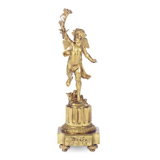 A GILT-BRONZE FIGURAL CANDELABRUM,